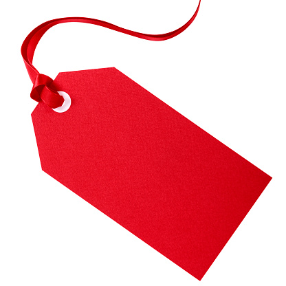 Red gift tag with red ribbon isolated on white
