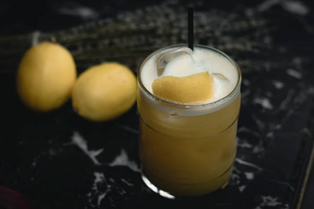 istock Coctail lemon on black desk 1189436287