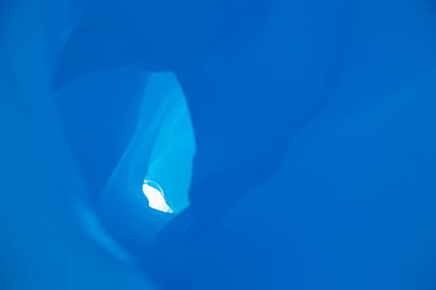 istock Blue tunnel ice cave. through the Matanuska Glacier in Alaska. 1189437662