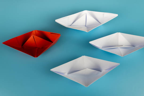 istock Red origami paper boat 1189438433