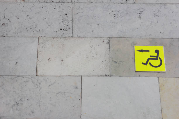 sign disabled wheelchair person copy space marbles blocks. design icon