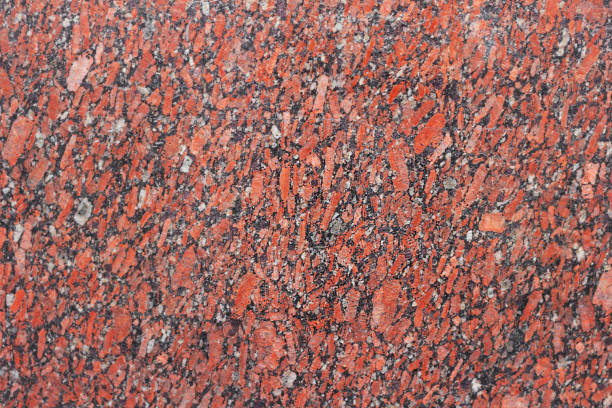 istock texture of red granite slabs. stone nature pattern . decorative geology surface 1189445047