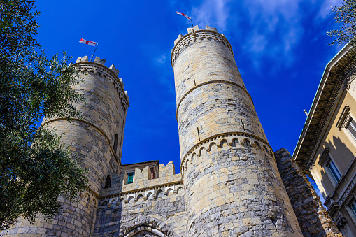 Genoa, Liguria, Italy - September 10, 2019:  Gate of the Wall of Barbarossa. Porta Soprana and blue sky