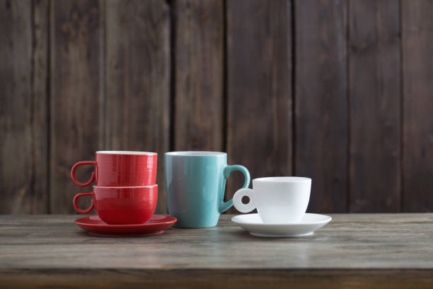 istock clean cup on old wooden background 1189465332