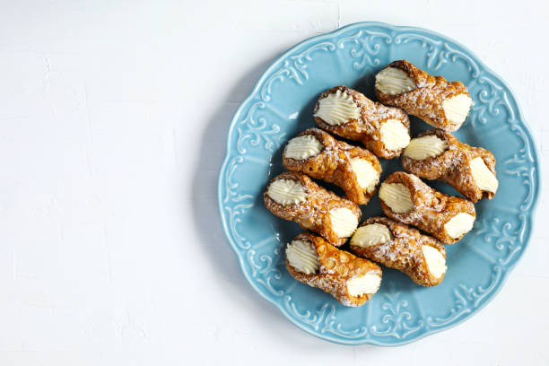 istock Traditional dessert Cannoli Siciliani stuffed with ricotta cream 1189468192