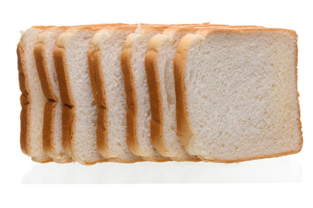 istock Fresh homemade  baked bread and sliced bread isoalted on  white 1189469990