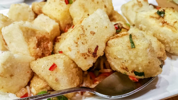 istock Salt and pepper deep-fried bean curd (torfu) cubes served on a plate 1189471055