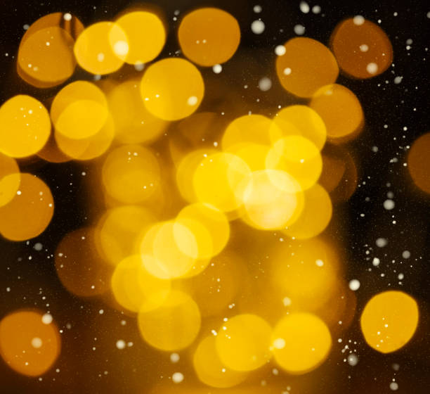 istock Abstract Christmas and New Year blurred bokeh with snowfall banner background 1189472728