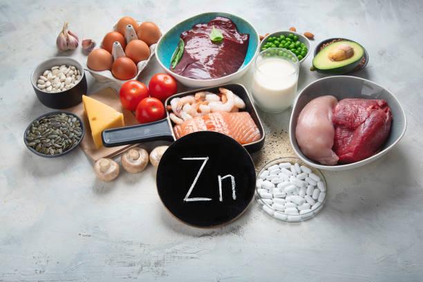 aliments riches en zinc - zinc mineral nutritional supplement pill photos et images de collection