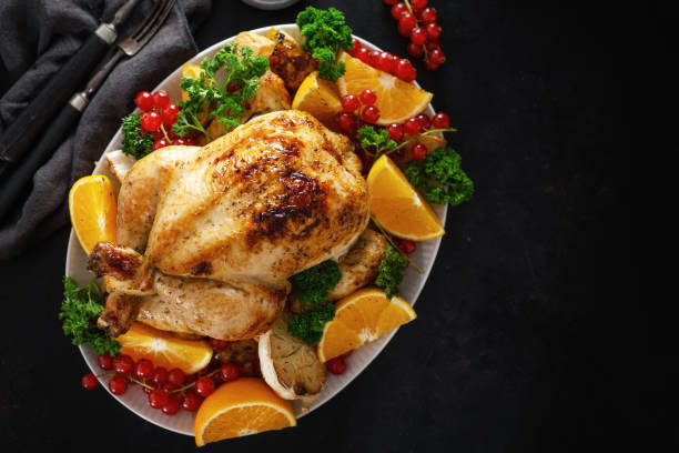 istock Tasty chicken or turkey on dark background 1189476635