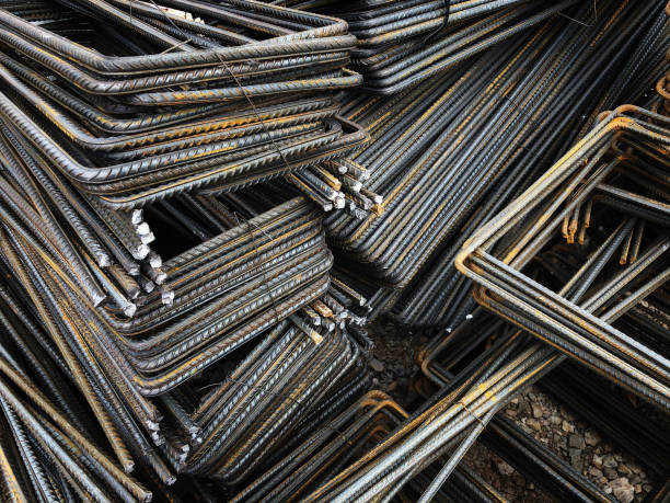 istock Piled iron reinforcement workpieces. Bent metal parts for reinforcement 1189477541