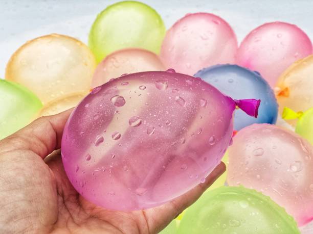 water balloons group of colorful water balloons water balloon stock pictures, royalty-free photos & images