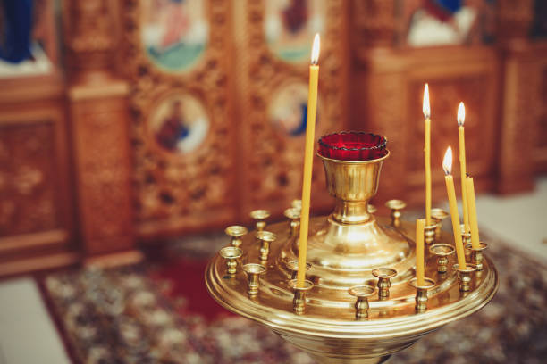 istock The candle flame in orthodox church, selective focus, closeup 1189478429