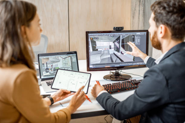 istock Two interior designers working in the office 1189487990