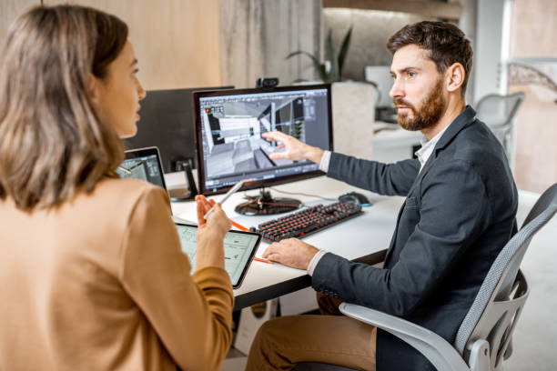 istock Two interior designers working in the office 1189487998