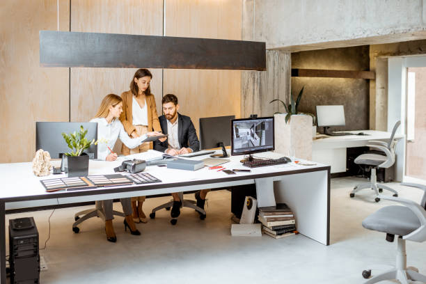istock Office employees having some creative work at the architectural bureau 1189488167