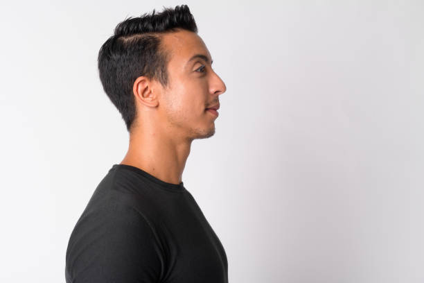istock Closeup profile view of handsome Hispanic man 1189488484