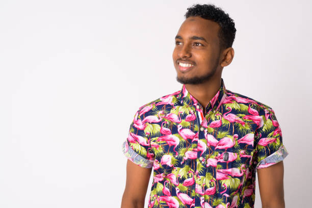 istock Happy young handsome African tourist man thinking 1189489208