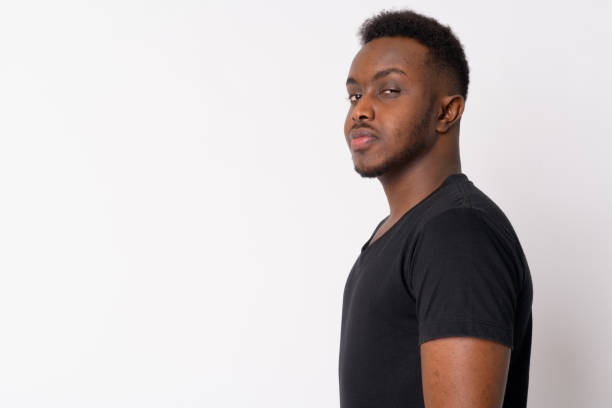istock Profile view of young African man looking at camera 1189489953