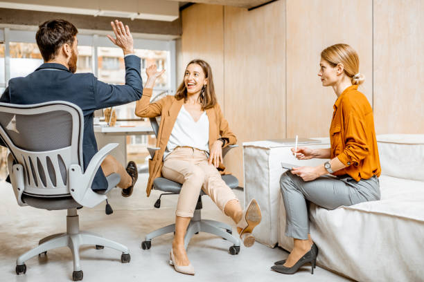 istock Playful employees having fun in the office 1189489956