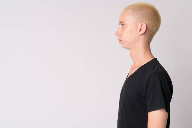 istock Profile view of young handsome androgynous man 1189490775