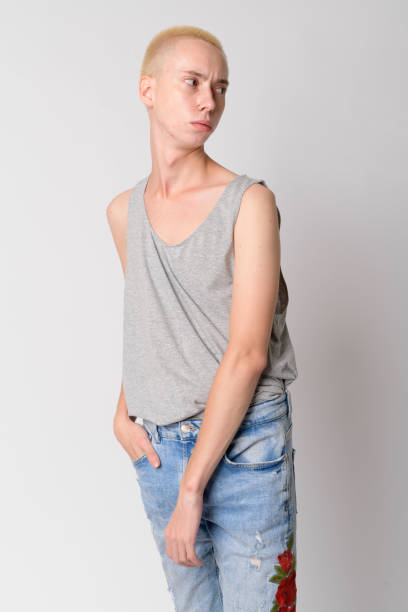 istock Portrait of young androgynous man thinking and looking back 1189490790