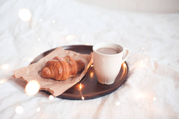 istock Tasty breakfast in bed close up 1189490793