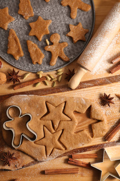 istock cooking christmas cookies, gingerbread biscuit 1189491061