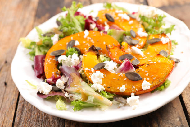 istock pumpkin slice, cheese and lettuce- winter salad 1189491116