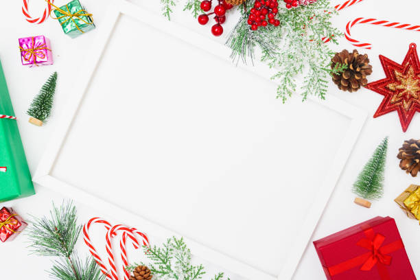 istock Christmas composition decorations, fir tree branches with Photo square frame on white background 1189493918