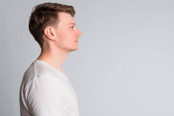 istock Closeup profile view of young handsome man 1189495302