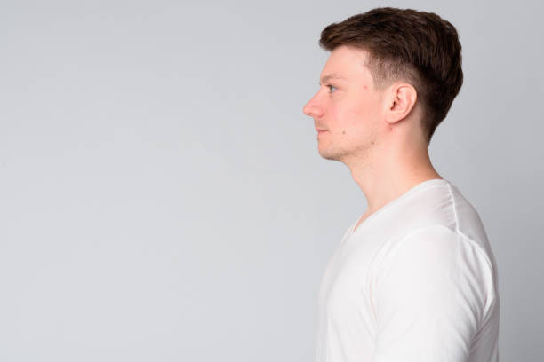 istock Closeup profile view of young handsome man 1189495480