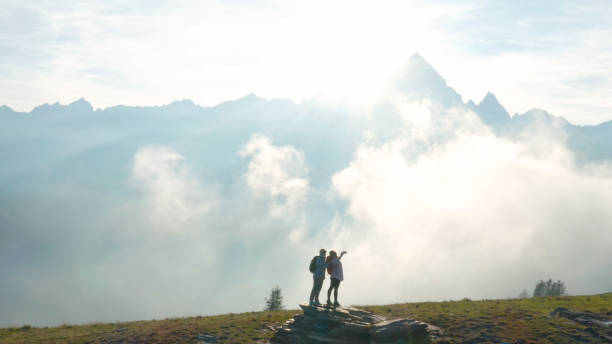 istock Female hikers take selfie in mountains 1189496147