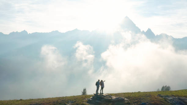 istock Female hikers take selfie in mountains 1189496151
