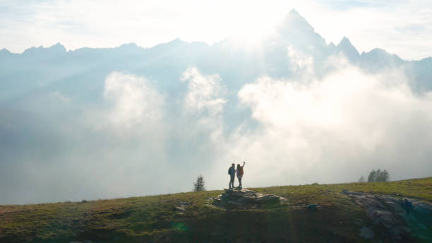 istock Female hikers take selfie in mountains 1189496301