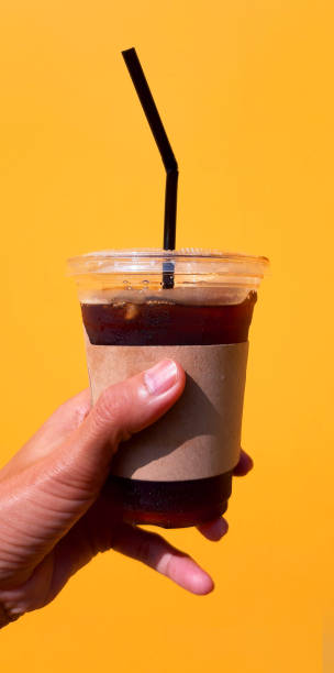 hand holding a Coffee cup,watering  in cup