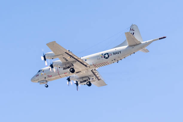 Oct 11, 2019 Sunnyvale / CA / USA - Close up of US Navy Lockheed P-3C Orion aircraft in mid-flight, preparing to land at Moffett Airfield in South San Francisco Bay Area