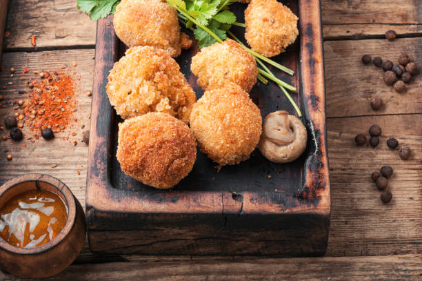 istock Mushrooms in breadcrumbs. 1189503331