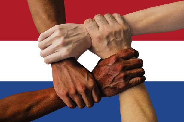 istock netherlands flag, intergration of a multicultural group of young people 1189507430