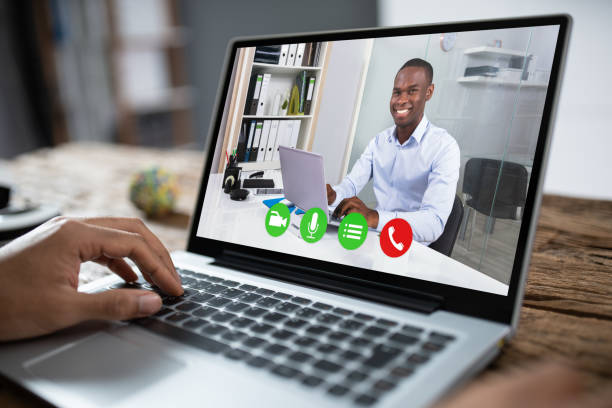 istock Cropped Image Of Businessman Using Laptop At Desk 1189508103