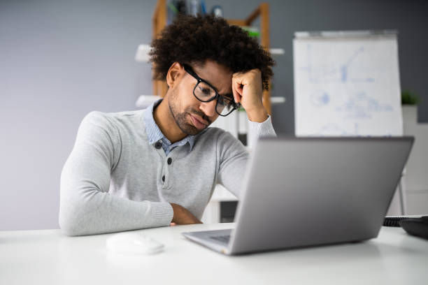 istock Stressful Business Man Working On Laptop 1189508241