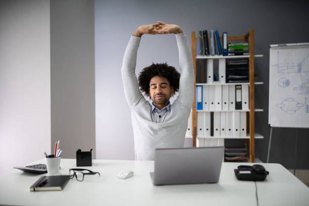 istock Businessman Stretching His Arms 1189508243