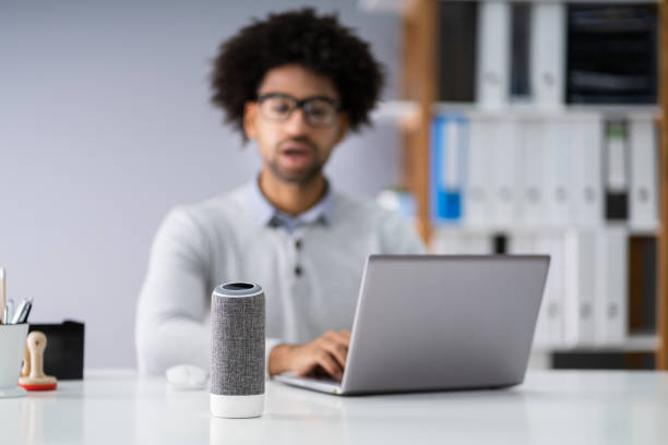 istock Man Listening To Music On Wireless Speaker 1189508281
