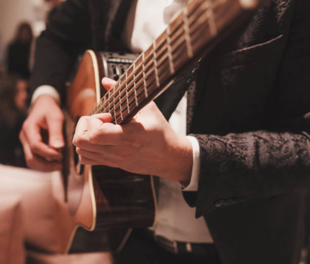 istock man plays the guitar 1189510389