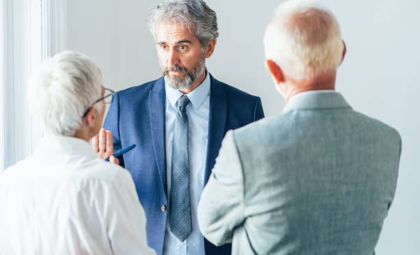 istock Senior business conversation 1189511699