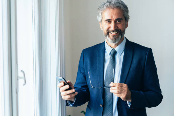 istock Businessman with smartphone 1189511703
