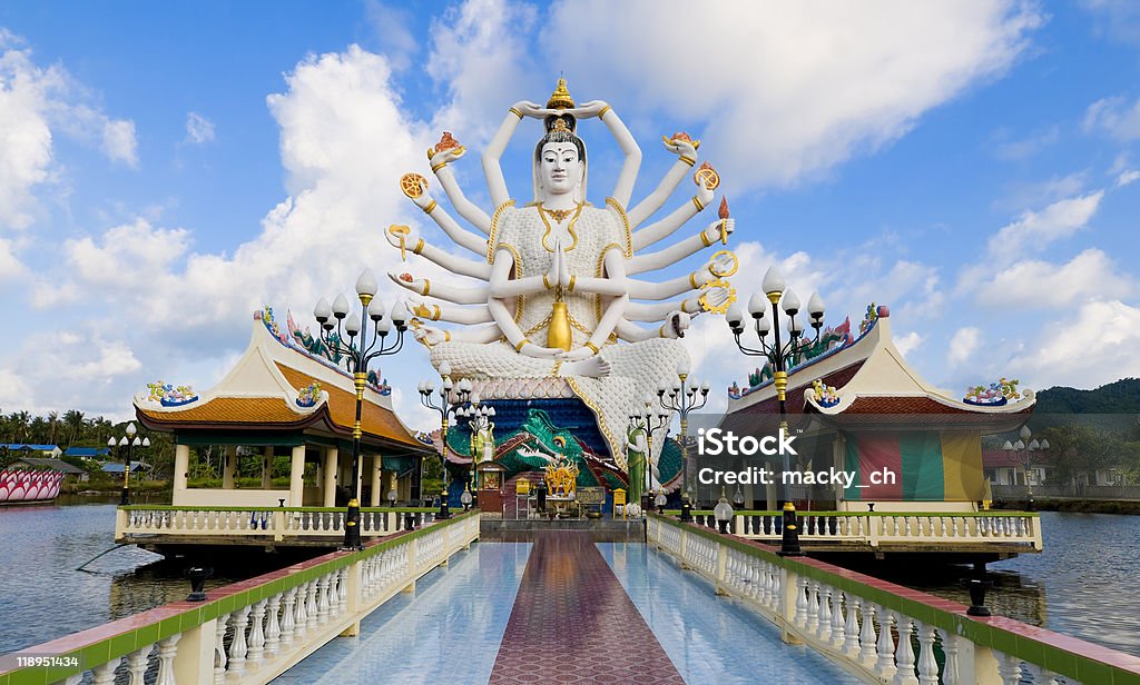 A statue of Shiva on the water in Koh Samui, Thailand statue of shiva on samui island in thailand Ancient Stock Photo