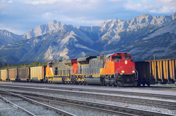 Freight container train in Jasper. Freight container train in Jasper. Alberta. Canada. freight train stock pictures, royalty-free photos & images
