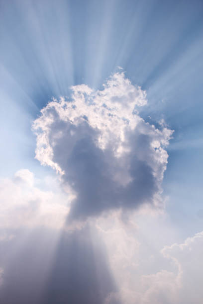 istock Sunbeam over the cloud showing dramatic view of cloudscape. Blue clear sky with sun ray is natural beauty. 1189532675