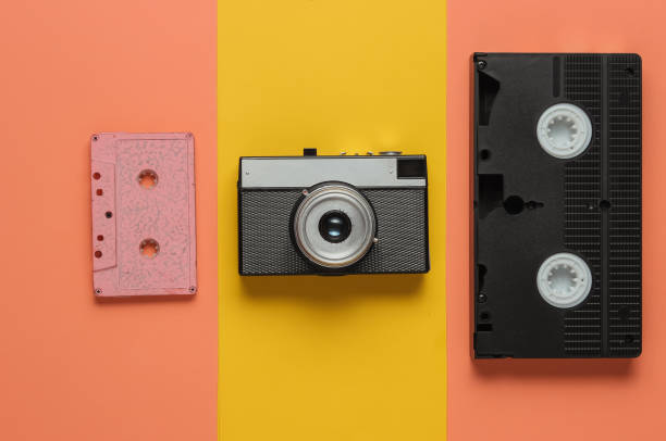 istock Entertainment and media 80s. Pop culture objects on a colored paper background. Top view. Minimalism 1189534792